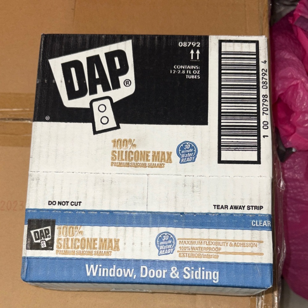 Box of DAP Silicone Max Sealant
